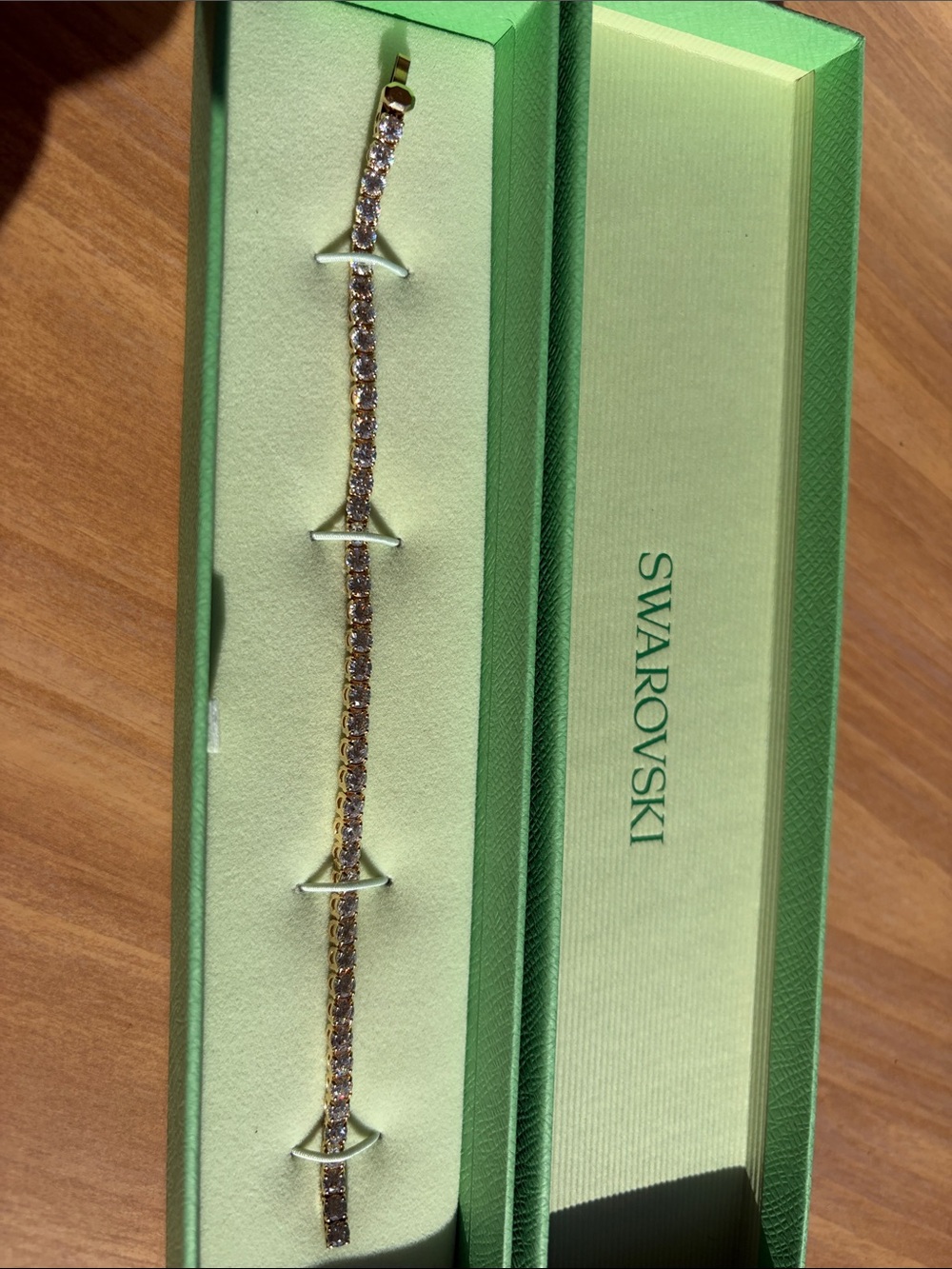 Swarovski Gold-Tone Bracelet with Pink Crystal Row